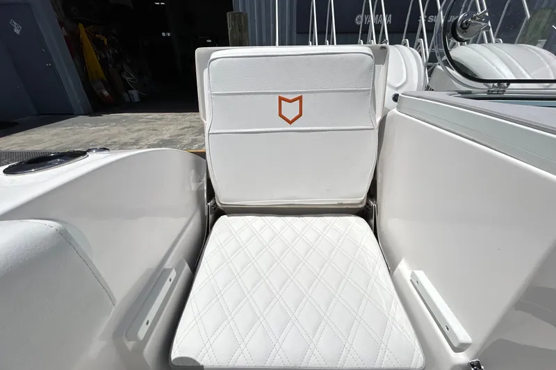 Slide: The Image of White seating on 2027 Sea Fox 328 Commander boat, featuring diamond stitching and logo. - 18