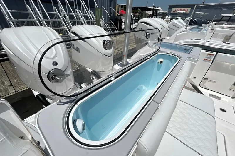 Slide: The Image of 2027 Sea Fox 328 Commander boat with Yamaha engines and sleek interior design. - 17