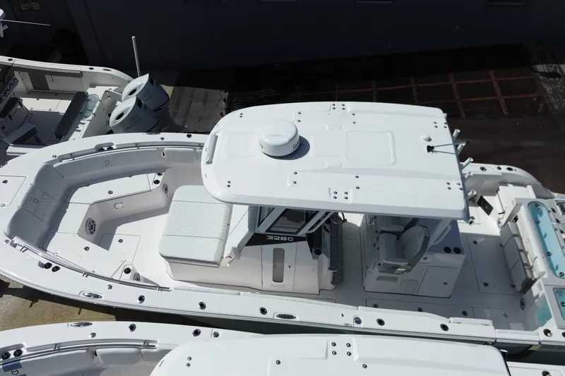 Slide: The Image of Aerial view of 2027 Sea Fox 328 Commander boat docked, showcasing spacious deck layout. - 36