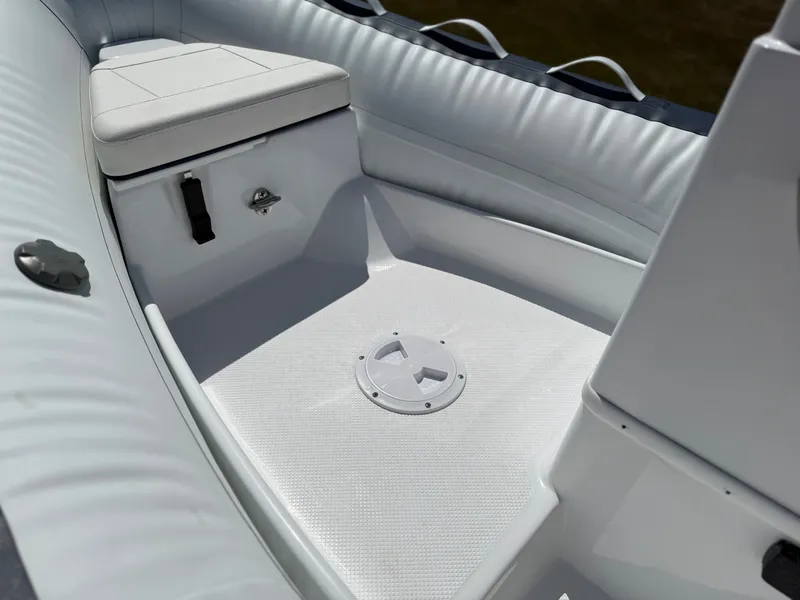 Slide: The Image of The image shows the interior of a 2026 Novurania 335DL with white upholstery. - 14