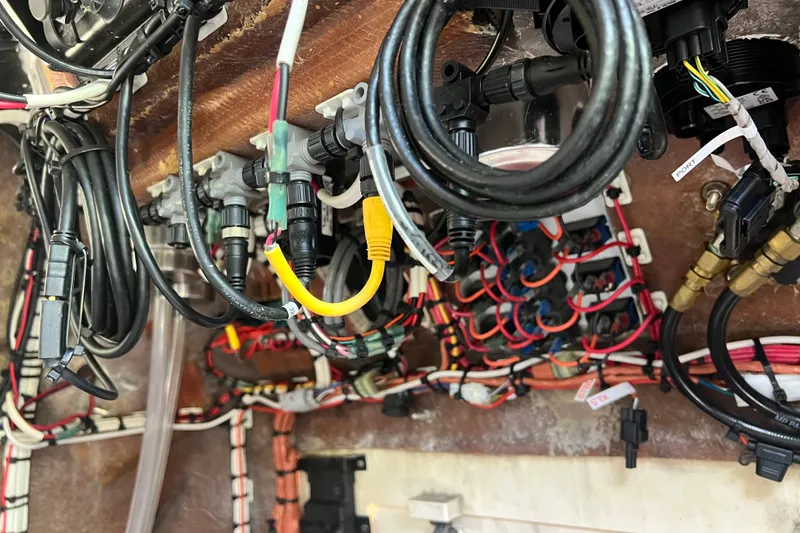 Slide: The Image of Wiring and cables inside a 2000 Cobia 274 Center Console boat. - 13