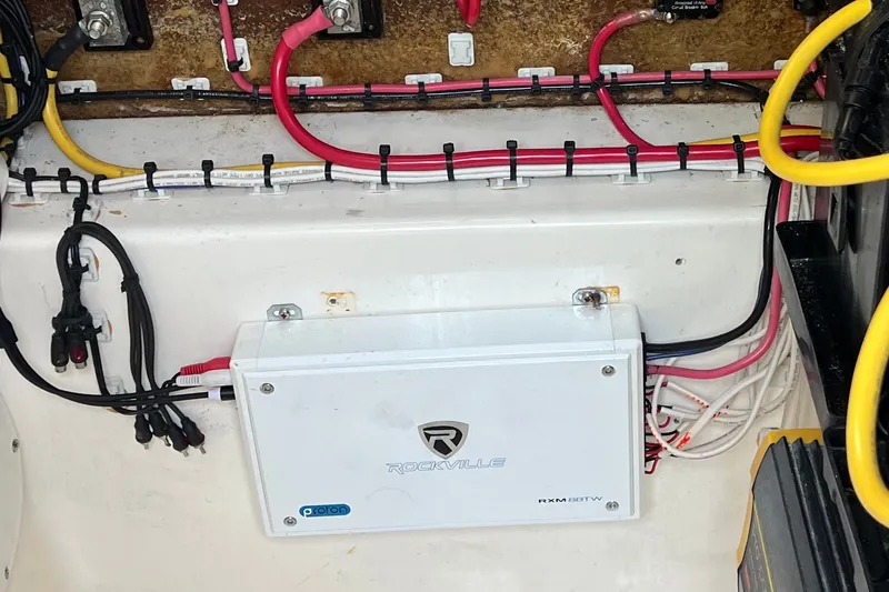 Slide: The Image of Electrical wiring setup in a 2000 Cobia 274 Center Console boat. - 14