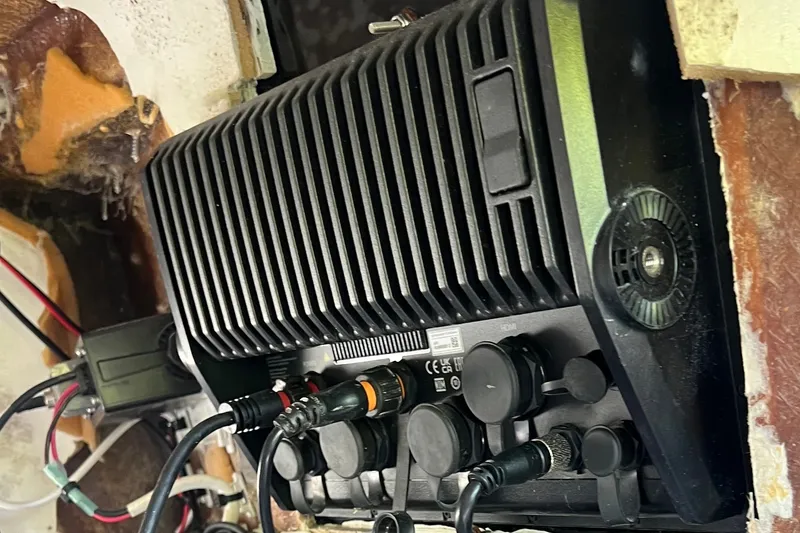 Slide: The Image of Electrical components inside a 2000 Cobia 274 Center Console boat. - 15
