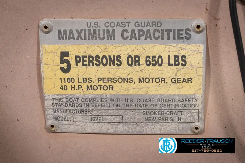 Slide: The Image of 2004 Smoker Craft Voyager capacity plate: 5 persons or 650 lbs, 40 HP motor. - 46