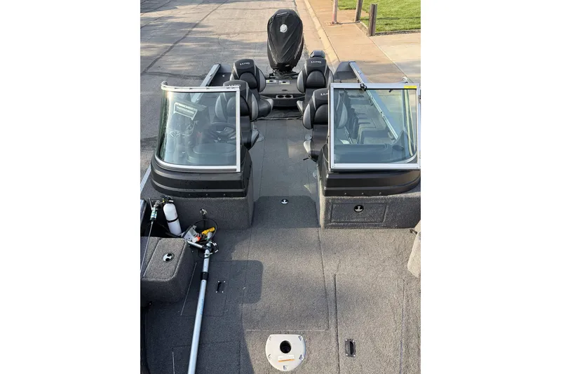 Slide: The Image of 2019 Lund 2025 Impact XS boat interior with seating and equipment. - 8