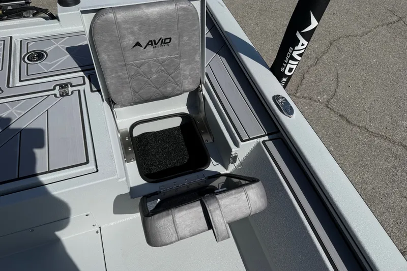 Slide: The Image of Avid 23 Mag 2027 boat seat with storage compartment, gray upholstery. - 24
