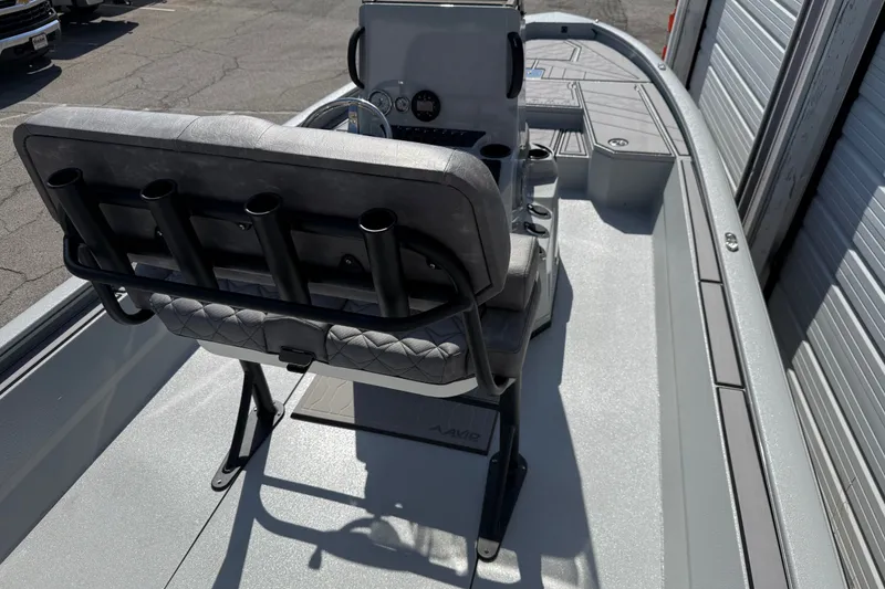 Slide: The Image of 2027 Avid 23 Mag boat interior with seating and rod holders. - 20