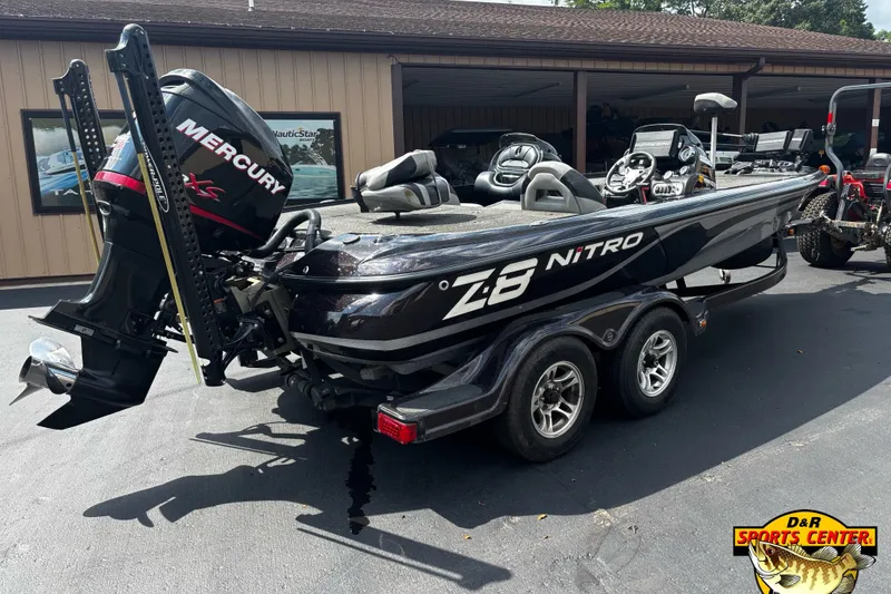 Slide: The Image of 2012 Nitro Z-8 boat with Mercury engine, parked at D&R Sports Center. - 3