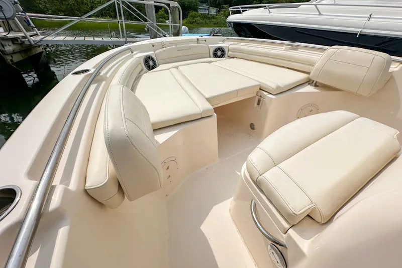 Slide: The Image of 2022 Grady-White Fisherman 216 boat with spacious, cushioned seating area. - 27