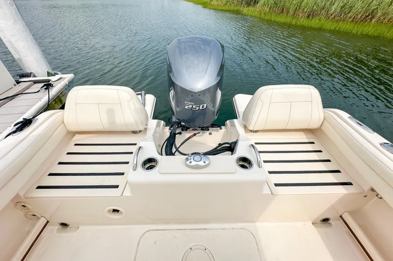 Slide: The Image of 2022 Grady-White Fisherman 216 boat with Yamaha 250 engine on calm water. - 23