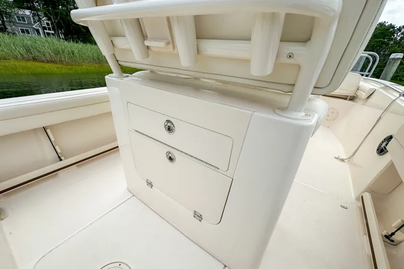 Slide: The Image of 2022 Grady-White Fisherman 216 boat interior with storage compartments. - 20