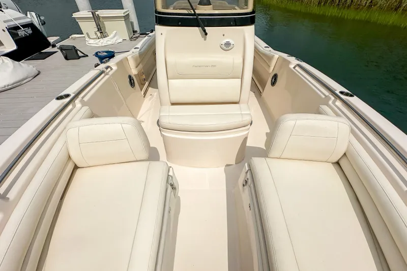 Slide: The Image of 2022 Grady-White Fisherman 216 boat interior with cushioned seating and sleek design. - 31