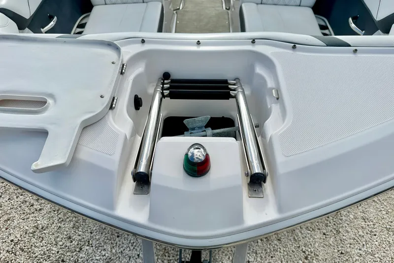 Slide: The Image of 2019 Regal 23 OBX boat bow with ladder and navigation light. - 27