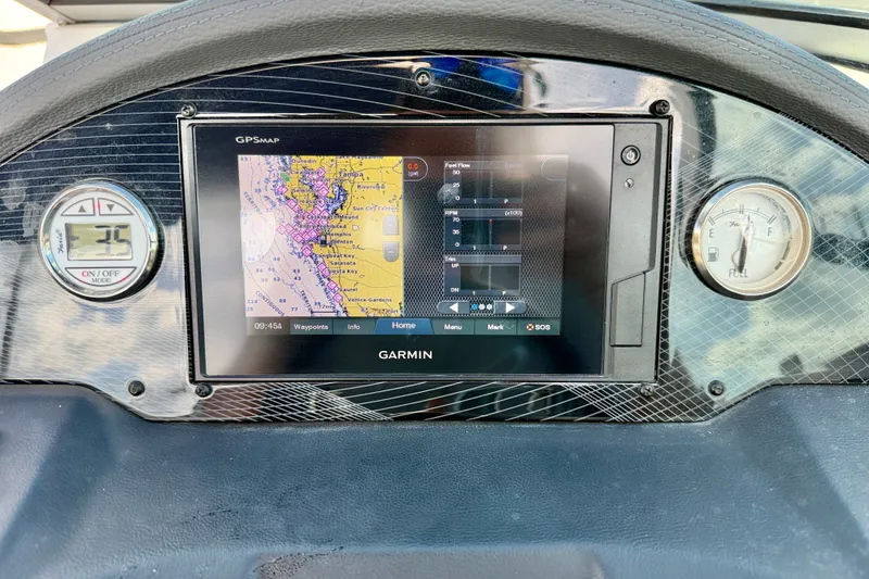 Slide: The Image of Dashboard of a 2019 Regal 23 OBX boat with Garmin GPS display. - 15