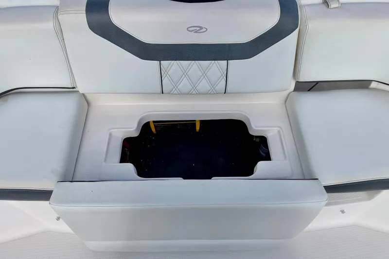 Slide: The Image of 2019 Regal 23 OBX boat seat with open storage compartment. - 37