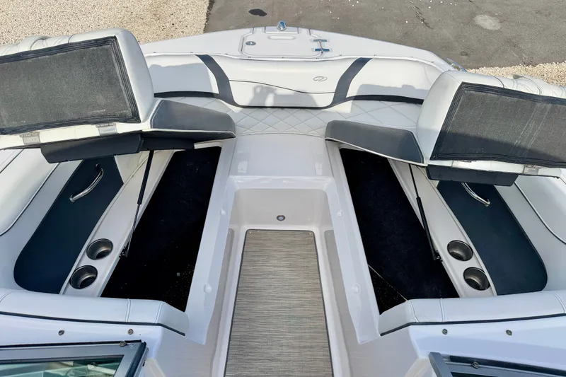 Slide: The Image of 2019 Regal 23 OBX boat interior with seating and cup holders. - 33