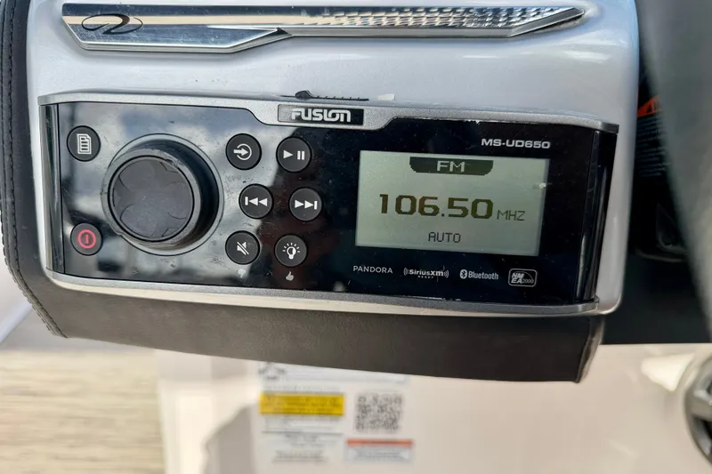 Slide: The Image of Fusion MS-UD650 stereo system on 2019 Regal 23 OBX, tuned to 106.50 MHz FM. - 16