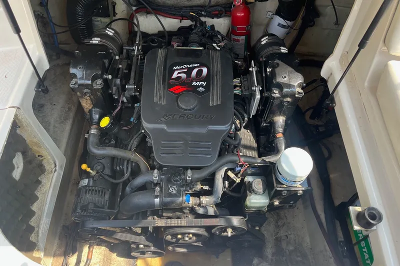 Slide: The Image of Engine compartment of a 2007 Sea Ray 240 Sundeck with MerCruiser 5.0 MPI engine. - 29