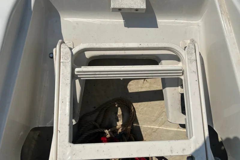 Slide: The Image of Foldable ladder on a 2007 Sea Ray 240 Sundeck boat, with rope storage. - 20