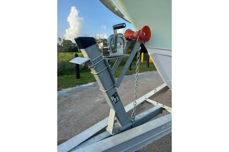 Slide: The Image of Trailer hitch of a 2020 Sea Hunt Ultra 275SE boat on a sunny day. - 32
