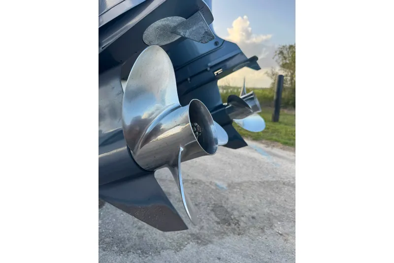 Slide: The Image of Close-up of 2020 Sea Hunt Ultra 275SE boat propellers on a sunny day. - 29