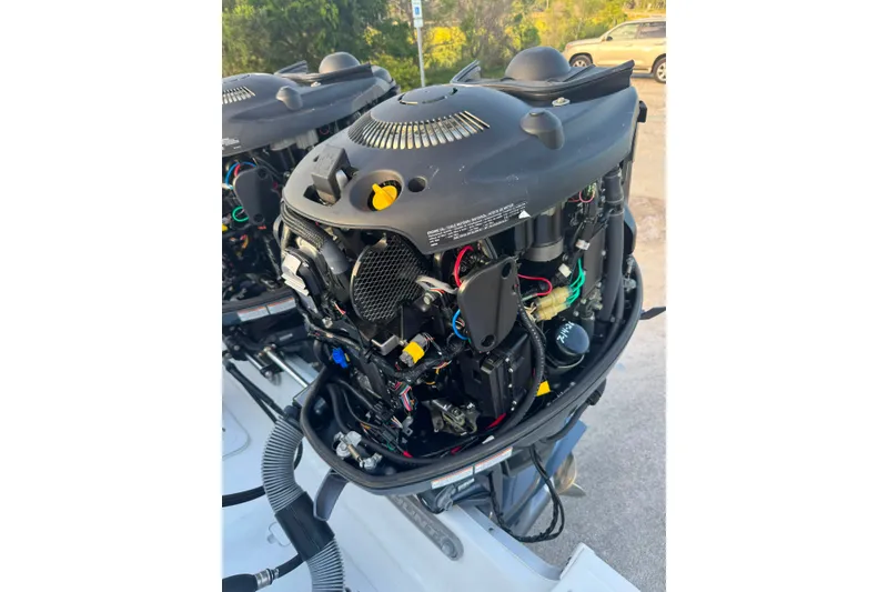 Slide: The Image of Open engine of a 2020 Sea Hunt Ultra 275SE boat, showcasing internal components. - 42