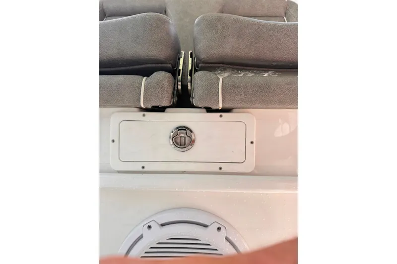Slide: The Image of 2020 Sea Hunt Ultra 275SE boat seating and storage compartment detail. - 51