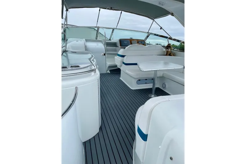 Slide: The Image of 2006 Formula 400 Super Sport yacht interior with sleek seating and modern amenities. - 12