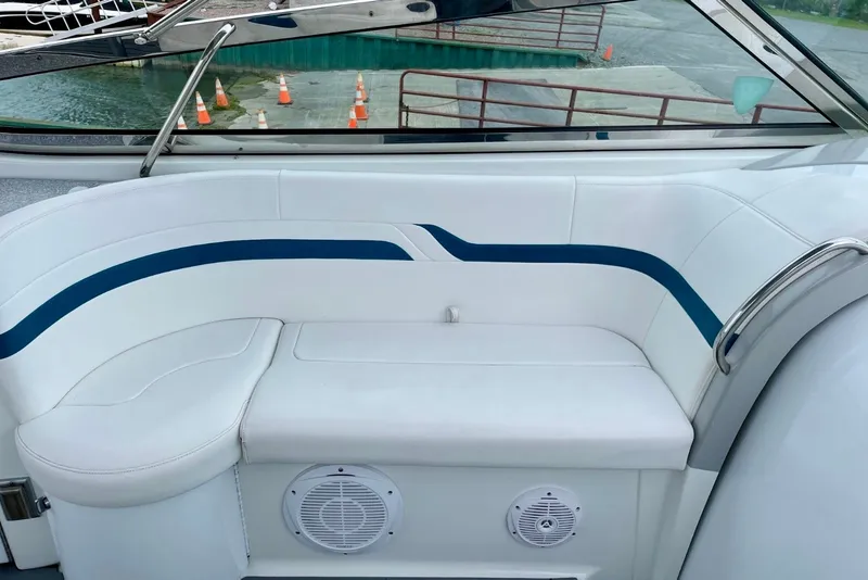 Slide: The Image of White and blue seating on a 2006 Formula 400 Super Sport boat. - 19