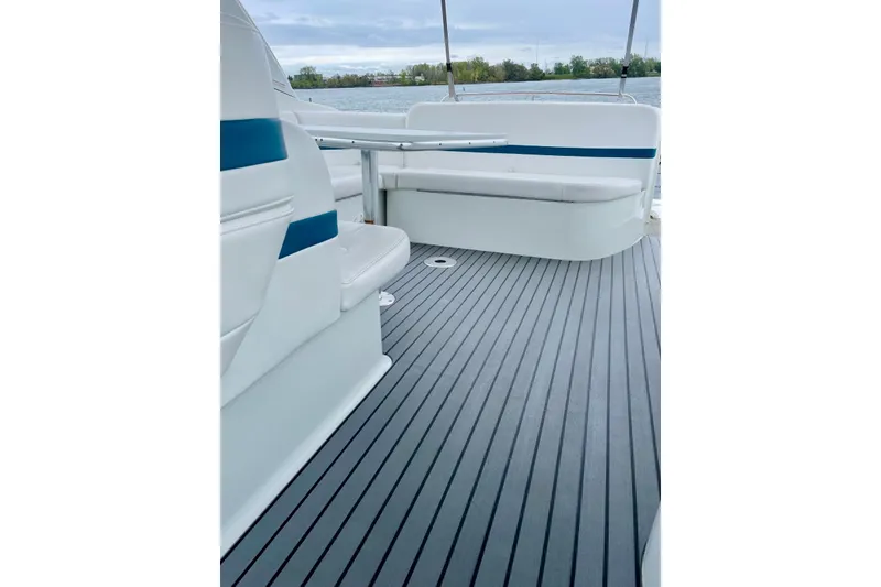 Slide: The Image of 2006 Formula 400 Super Sport boat interior with sleek seating and modern flooring. - 18