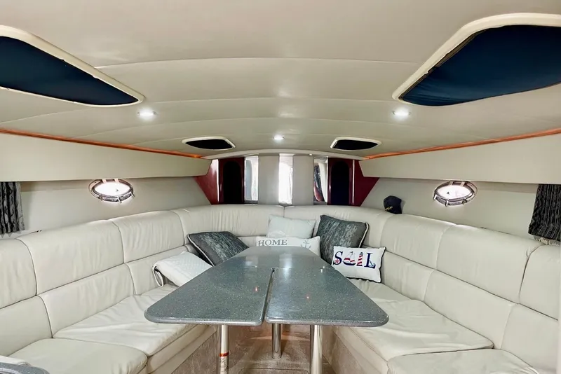 Slide: The Image of Interior of 2006 Formula 400 Super Sport yacht with plush seating and table. - 29