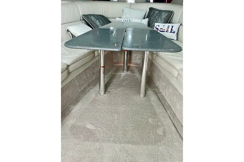 Slide: The Image of Interior of 2006 Formula 400 Super Sport yacht with elegant seating and table. - 30