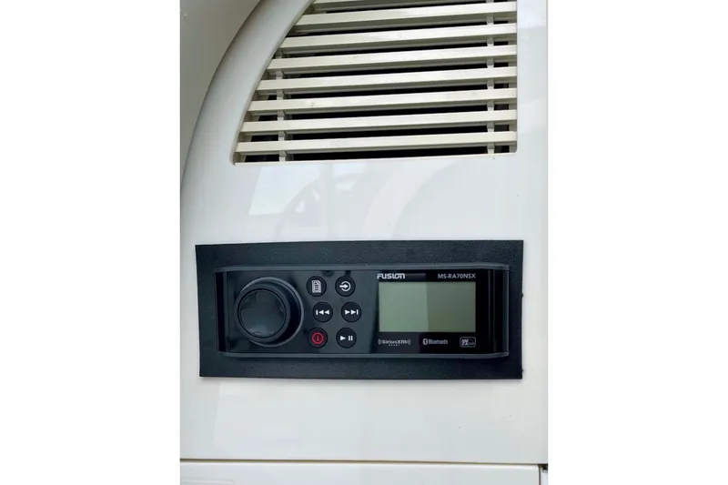 Slide: The Image of Fusion MS-RA70NSX stereo system on 2006 Formula 400 Super Sport boat dashboard. - 22