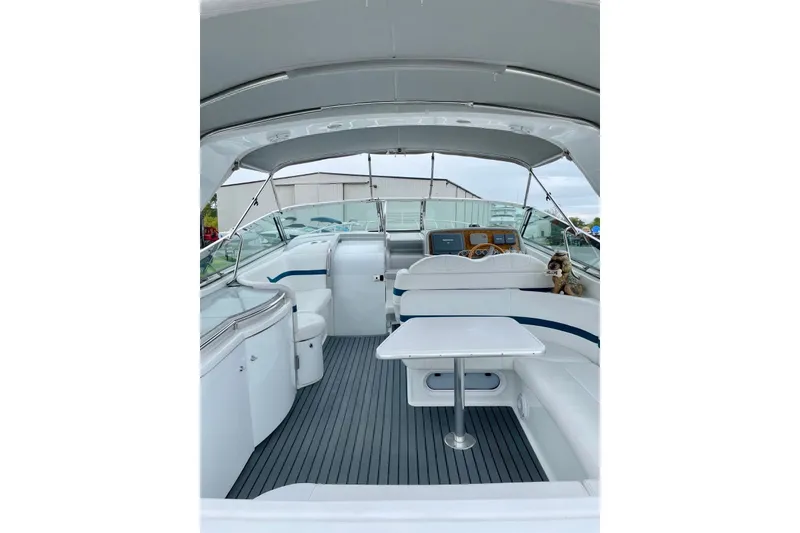 Slide: The Image of Interior view of a 2006 Formula 400 Super Sport boat with seating and helm. - 10