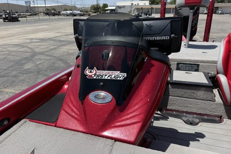 Slide: The Image of 2022 Phoenix 921 Elite boat interior with Humminbird electronics and "First Flight" decal. - 20