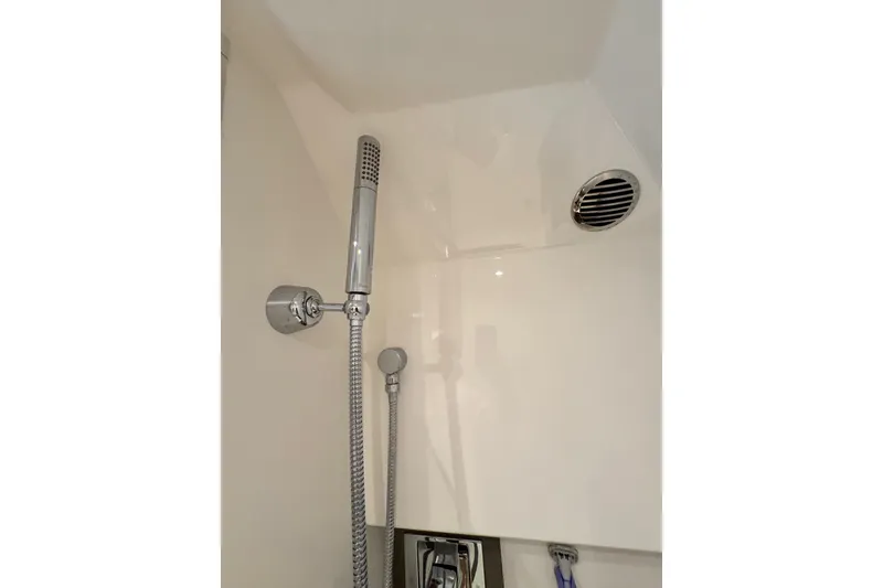 Slide: The Image of Shower area in 2023 Tiara Yachts 43 LE, featuring modern fixtures and ventilation. - 45