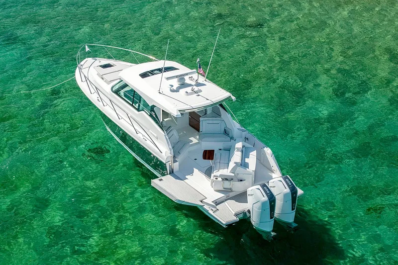 The Image of Manufacturer Provided Image: 2023 Tiara Yachts 43 LE luxury boat on clear turquoise water. - 5