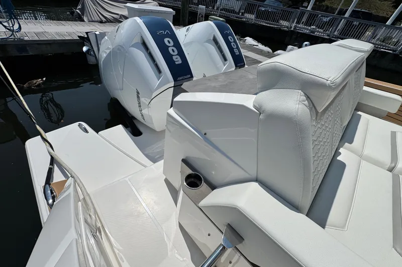 Slide: The Image of 2023 Tiara Yachts 43 LE with dual Mercury 600 engines at dock. - 31