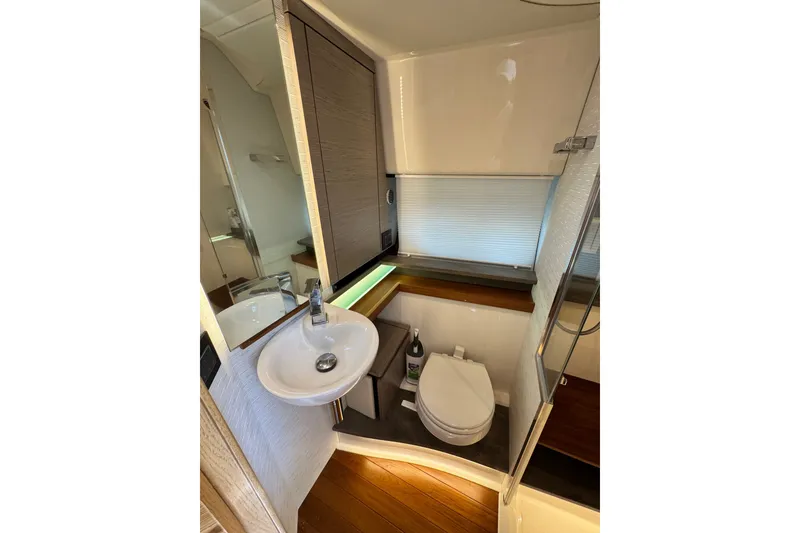 Slide: The Image of Luxurious bathroom in 2023 Tiara Yachts 43 LE, featuring modern fixtures and elegant design. - 47