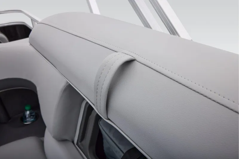 Slide: The Image of Manufacturer Provided Image: 2026 Sun Tracker SportFish 22 XP3 boat interior with gray upholstery detail. - 55