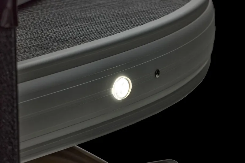 Slide: The Image of Manufacturer Provided Image: 2026 Sun Tracker SportFish 22 XP3 boat with illuminated deck light detail. - 21