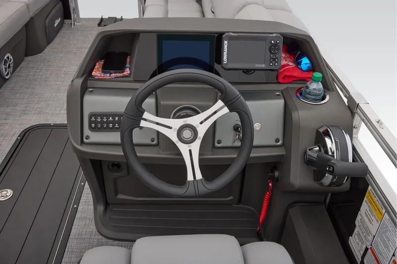 Slide: The Image of Manufacturer Provided Image: 2026 Sun Tracker SportFish 22 XP3 helm with steering wheel, controls, and navigation equipment. - 41