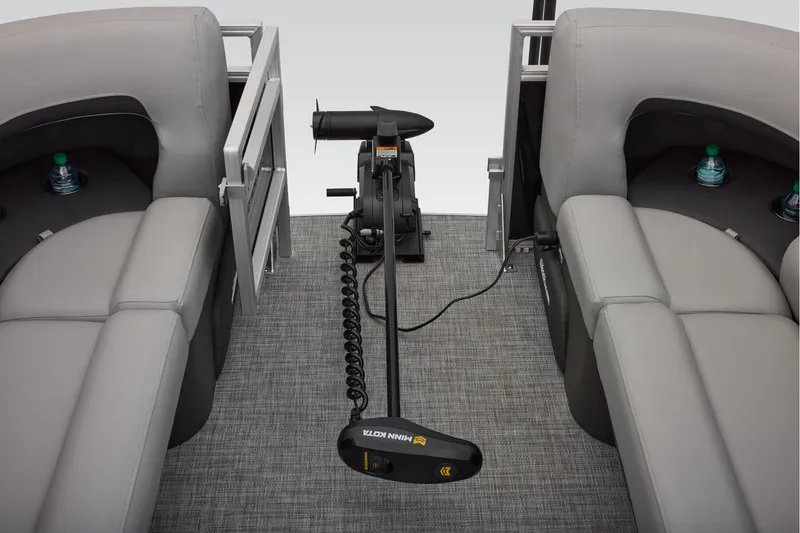 Slide: The Image of Manufacturer Provided Image: 2026 Sun Tracker SportFish 22 XP3 interior with gray seating and trolling motor. - 27