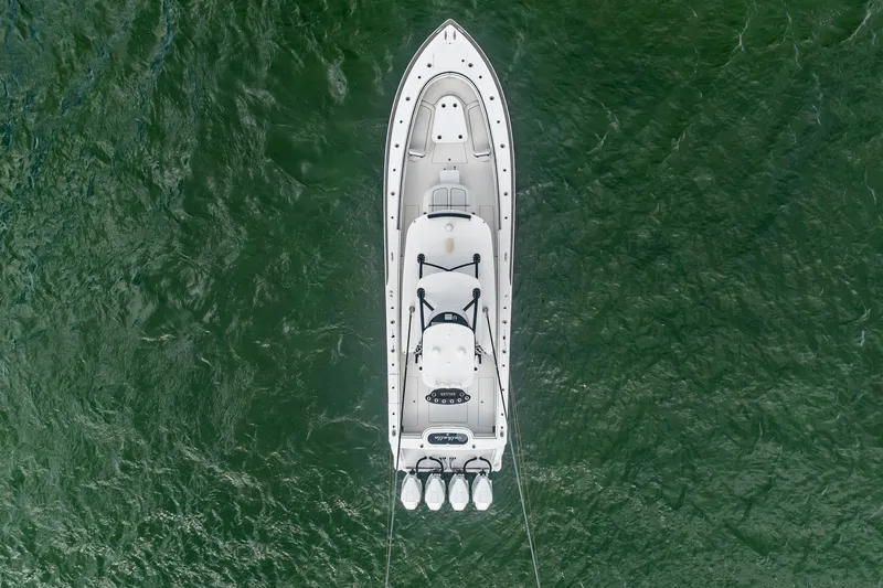 Slide: The Image of Aerial view of 2022 Valhalla V-41 boat on green water. - 13
