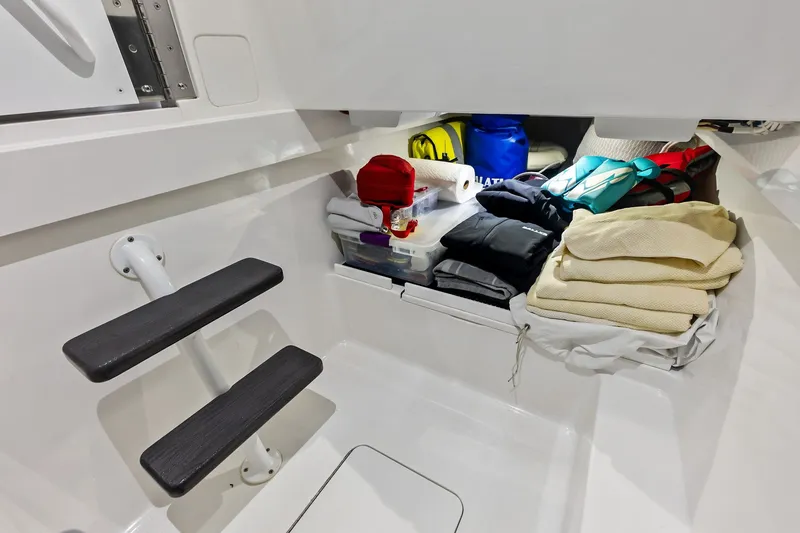 Slide: The Image of Interior storage area of 2022 Valhalla V-41 boat with organized gear and supplies. - 67