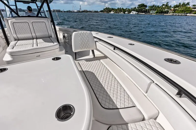 Slide: The Image of 2022 Valhalla V-41 boat interior with luxurious seating on open water. - 58