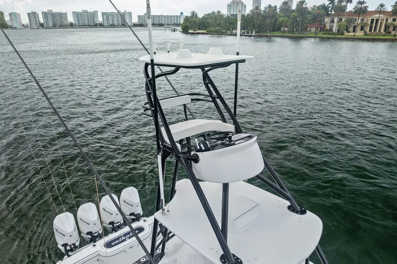 Slide: The Image of Valhalla V-41 boat with tower and multiple engines on a scenic waterway, 2022 model. - 11