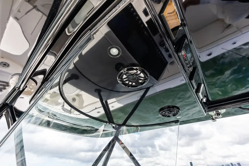 Slide: The Image of Interior view of 2022 Valhalla V-41 boat, showcasing sleek design and advanced controls. - 49
