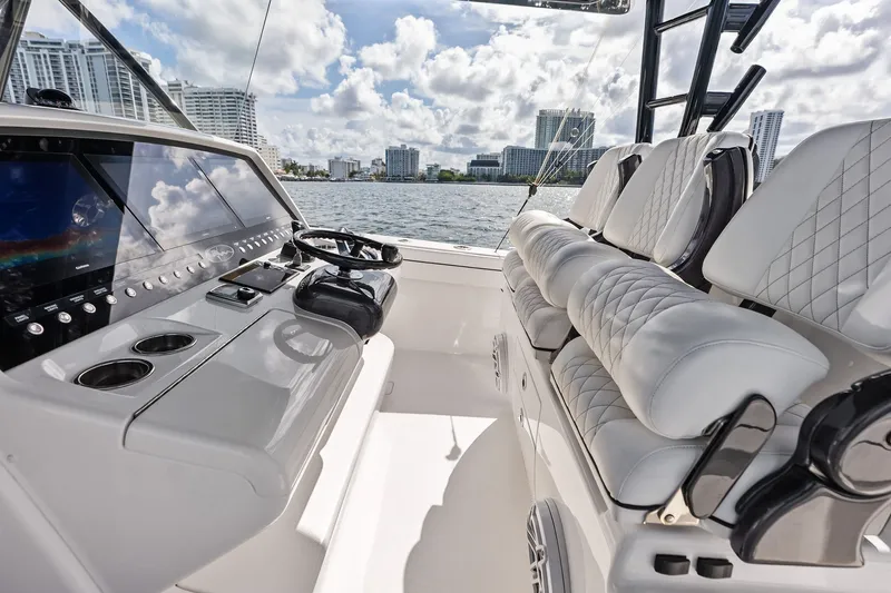 Slide: The Image of 2022 Valhalla V-41 boat interior with modern helm and luxurious seating. - 43