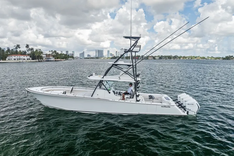 Slide: The Image of 2022 Valhalla V-41 boat on water with city skyline in background. - 5
